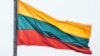 LITHUANIA – Lithuanian flag over the city of Kaunas, which is located 104 kilometers from the capital of Lithuania